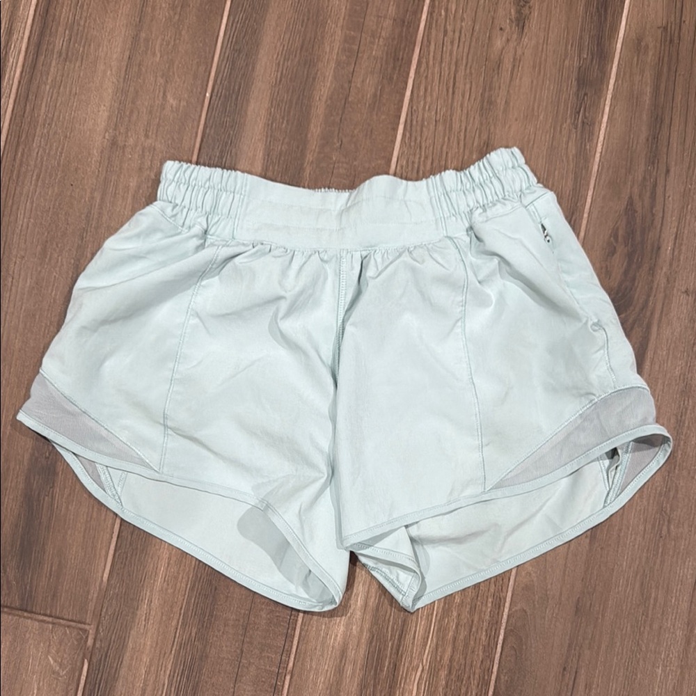 Lululemon Blue Green Athletic Shorts with Elastic Waistband and Curved Hem